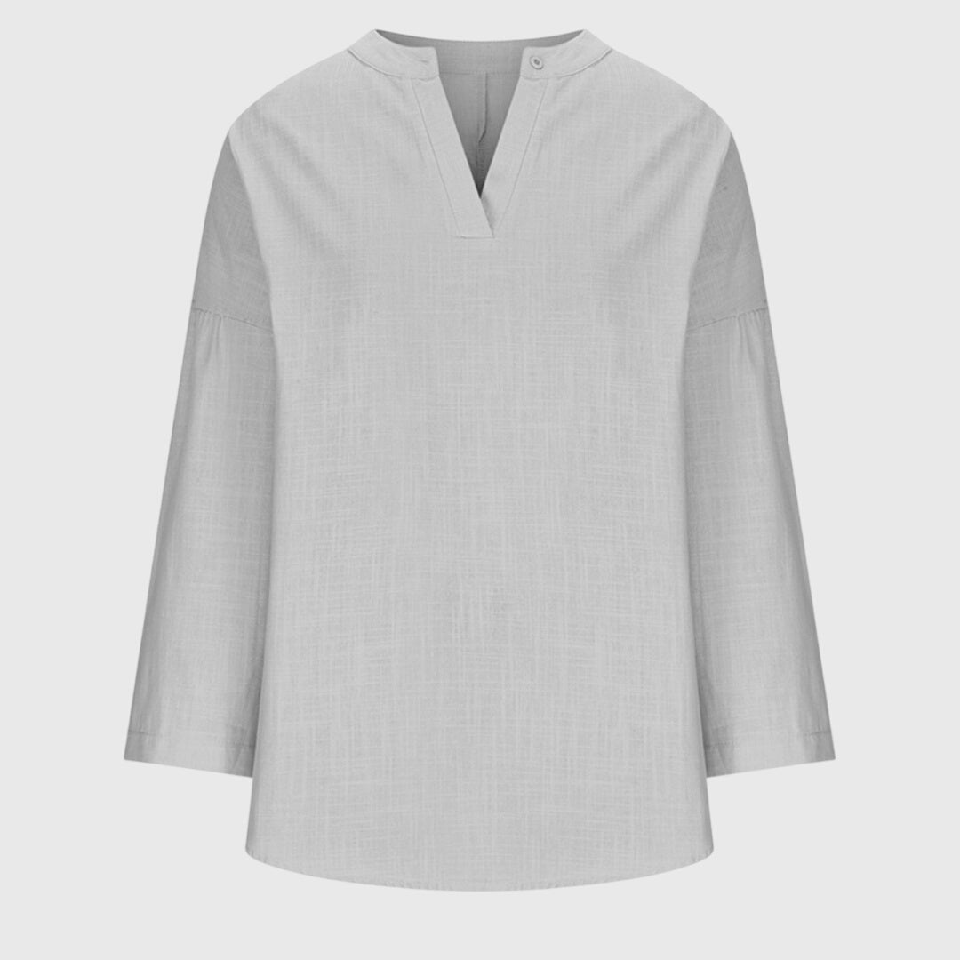 Moderne Damen V-Ausschnitt Sommerbluse, locker und fließend für eine bequeme Passform.