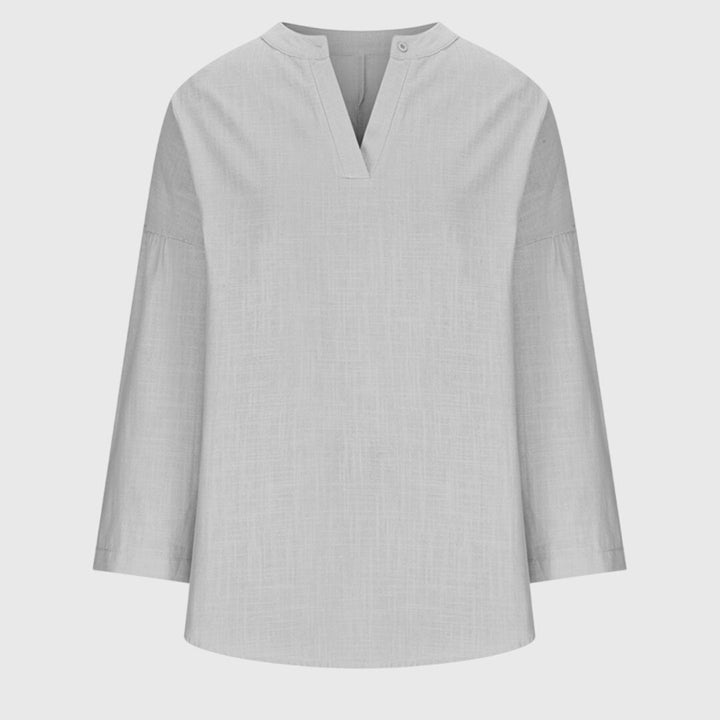 Moderne Damen V-Ausschnitt Sommerbluse, locker und fließend für eine bequeme Passform.