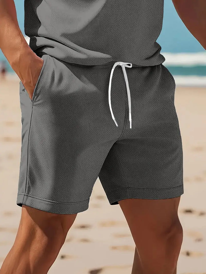 Aktives Herren Zweiteiler-Set, T-Shirt & Shorts für Sport & Casual Look.