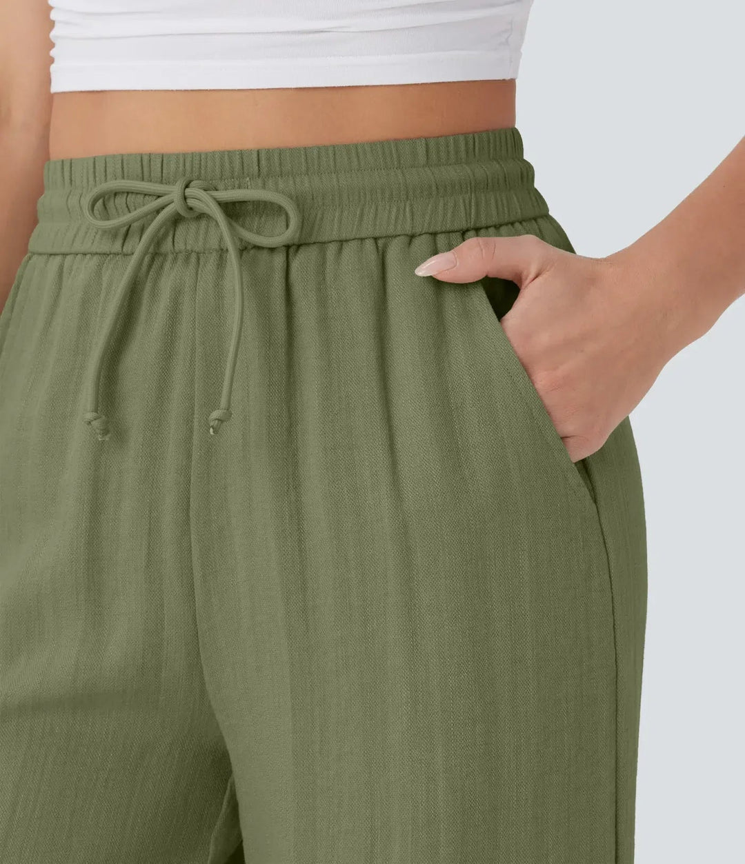 Damenhose weites Bein: elegante Sommerhose. Lockerpassform, Kordelzug & Seitentaschen. Stilvoll.