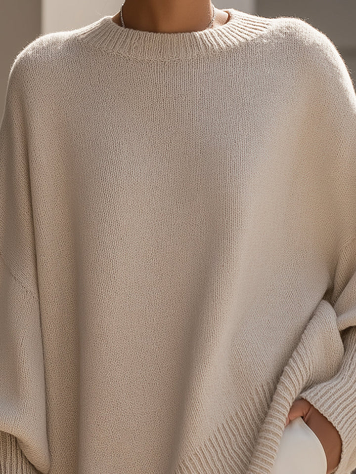 Moderner Damen Oversized Strickpullover mit eleganten Fledermausärmeln. Bequemer Rundhals-Look.