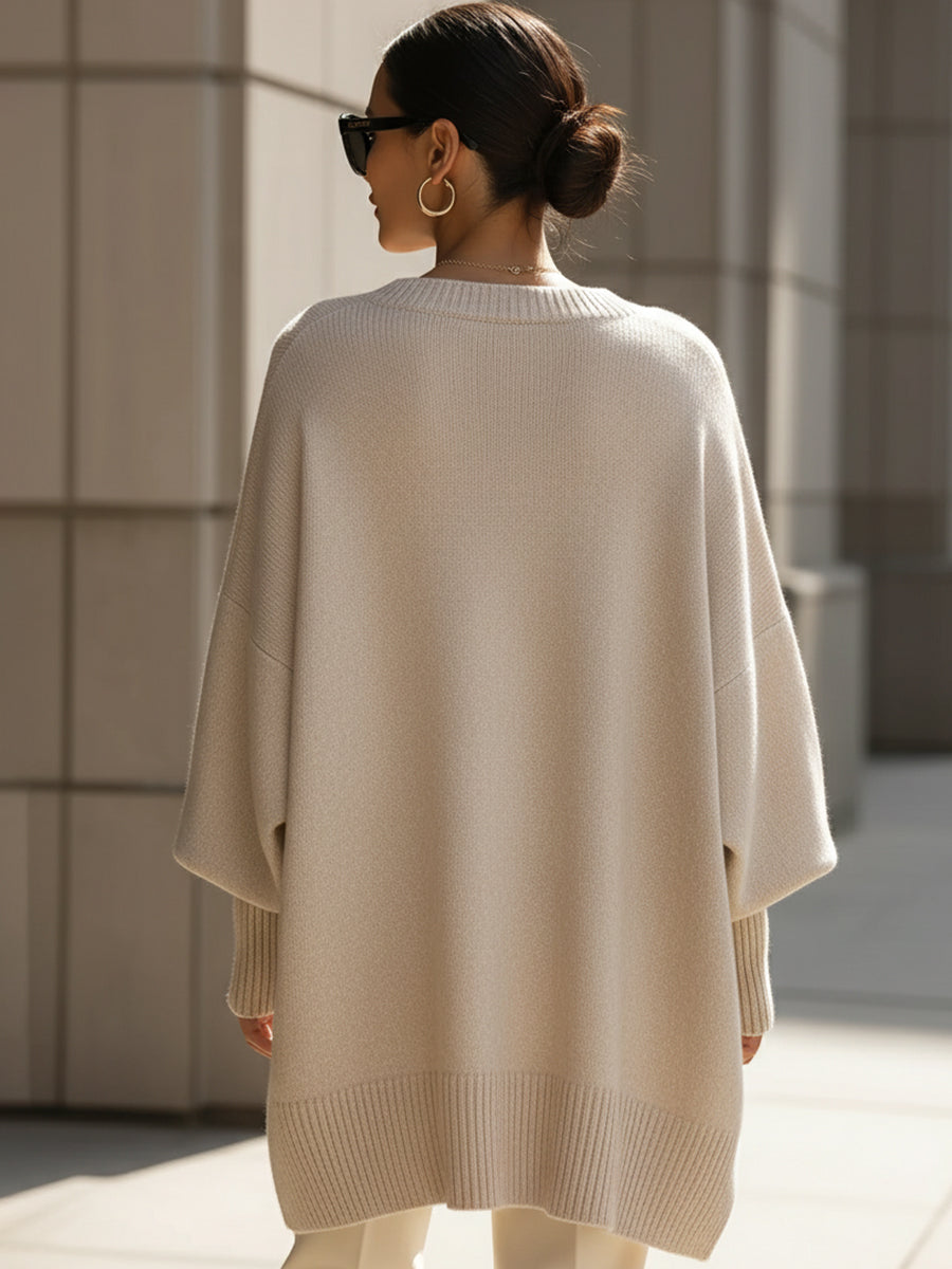 Damen Strickpullover mit Fledermausärmeln, oversized. Rundhals für lässigen Herbst-Stil.