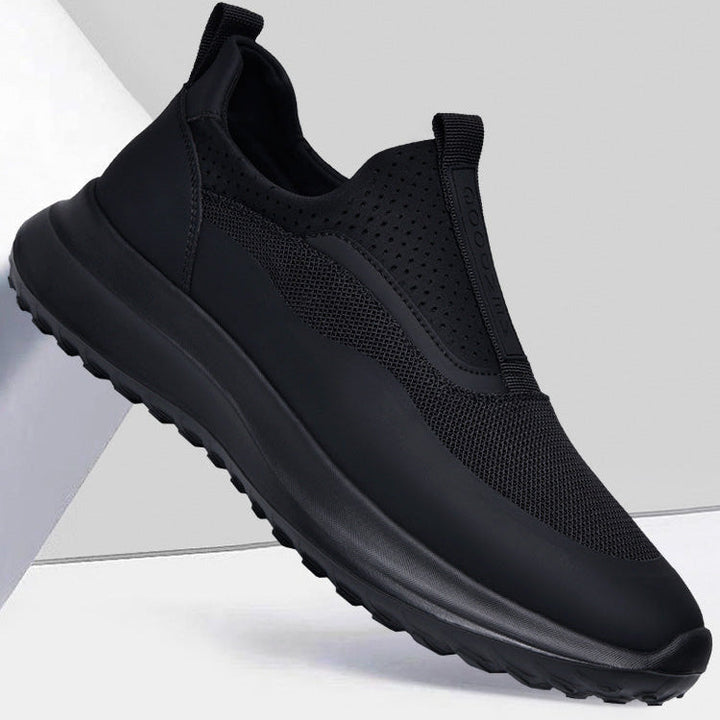 Ein Paar schwarze Orthopädische Herren Sportschuhe, die Komfort, Stabilität und eine rutschfeste Sohle bieten.