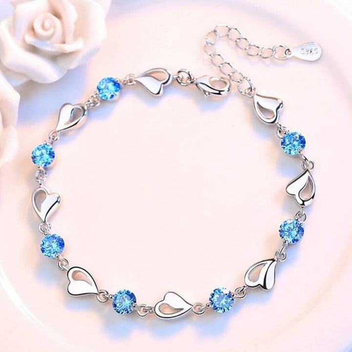 Schmuck: Silbernes Herzarmband für Damen, zeitlos schön und stilvoll für Frauen.