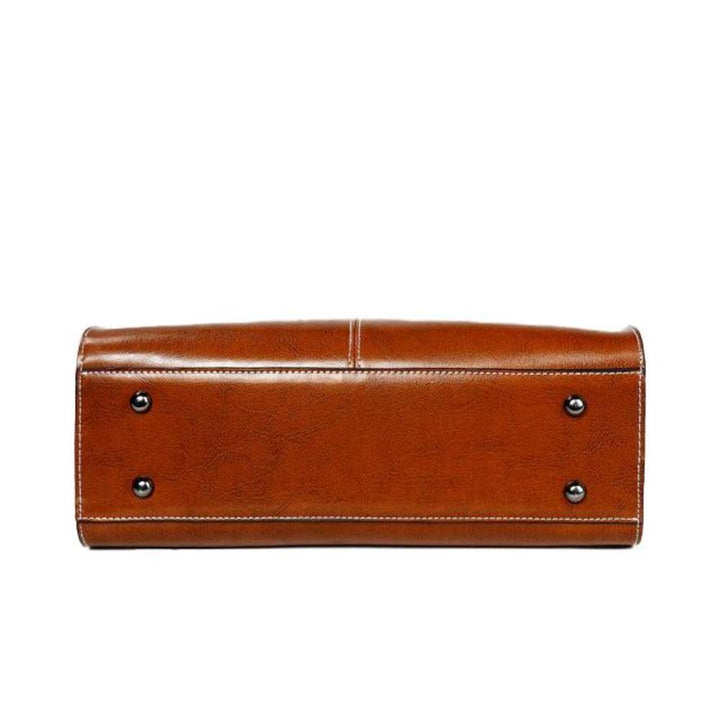 Dunkelblaue Mitternacht Leder-Tote-Handtasche für Damen, elegant, organisiert & vielseitig.