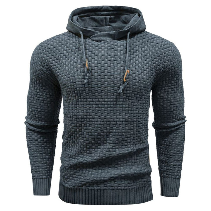 Warmer Kapuzenpullover Herren, steingrau, im Freien getragen. Perfekt für kühle Tage.