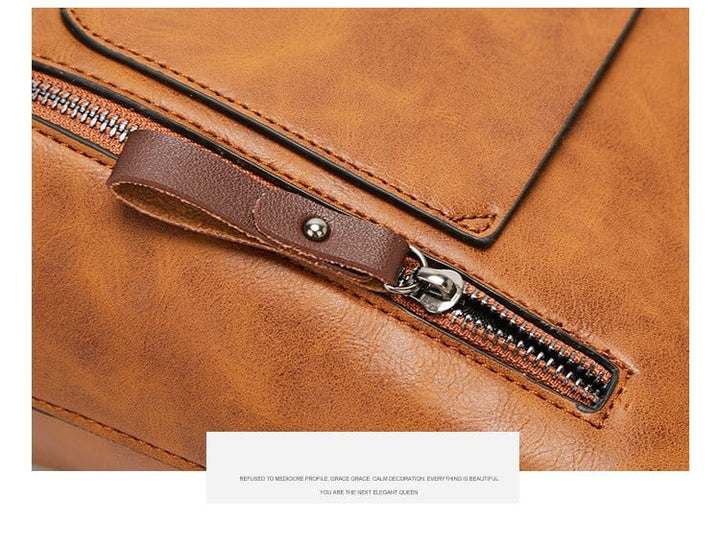 Stilvolle schwarze Damen Schultertasche Ralaana aus weichem Leder, mit verstellbarem Riemen.