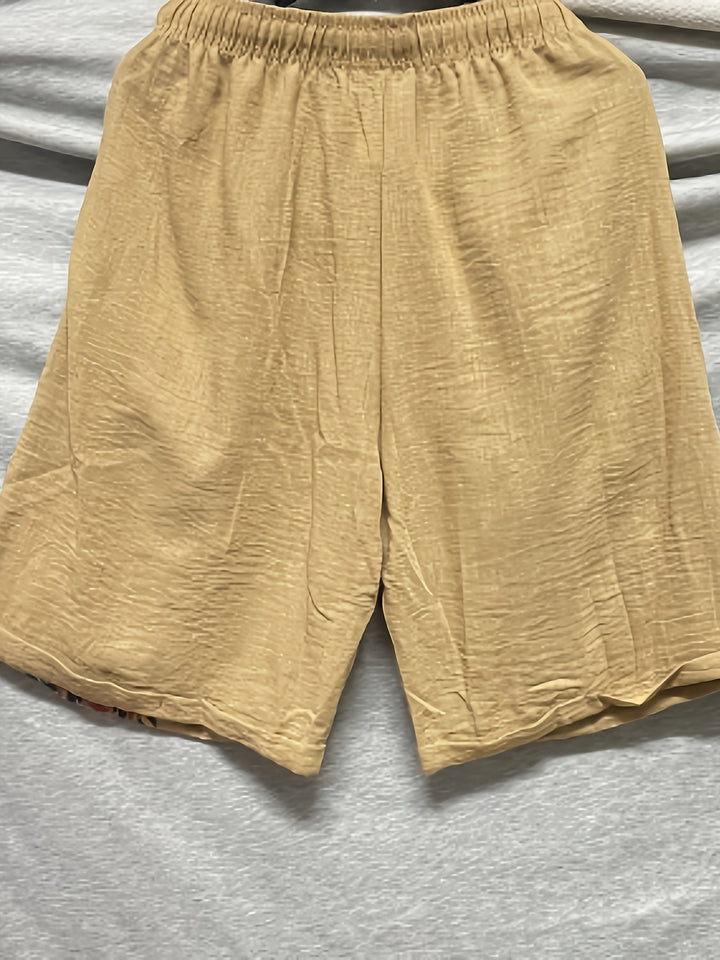 Sommerliche Herren Ethno-Shorts mit auffälligem geometrischem Muster, perfekt für Strand & lässige Looks.