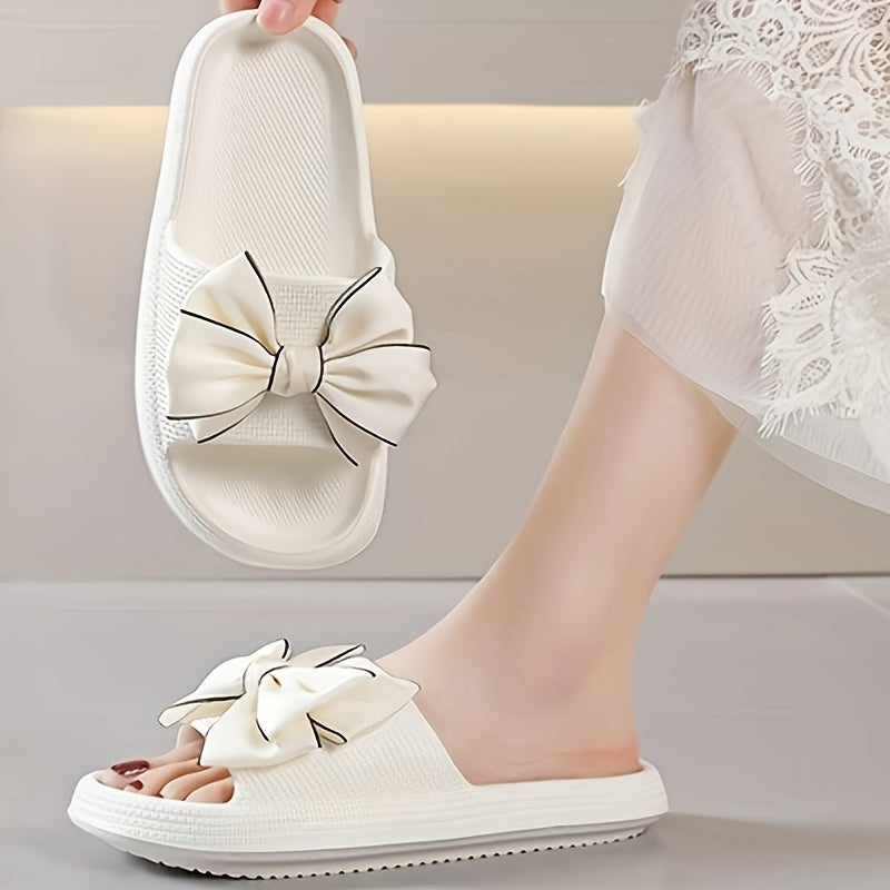 Damen Slide Sandalen mit Schleife, ideal als Poolschuhe oder bequeme Urlaubsschuhe.
