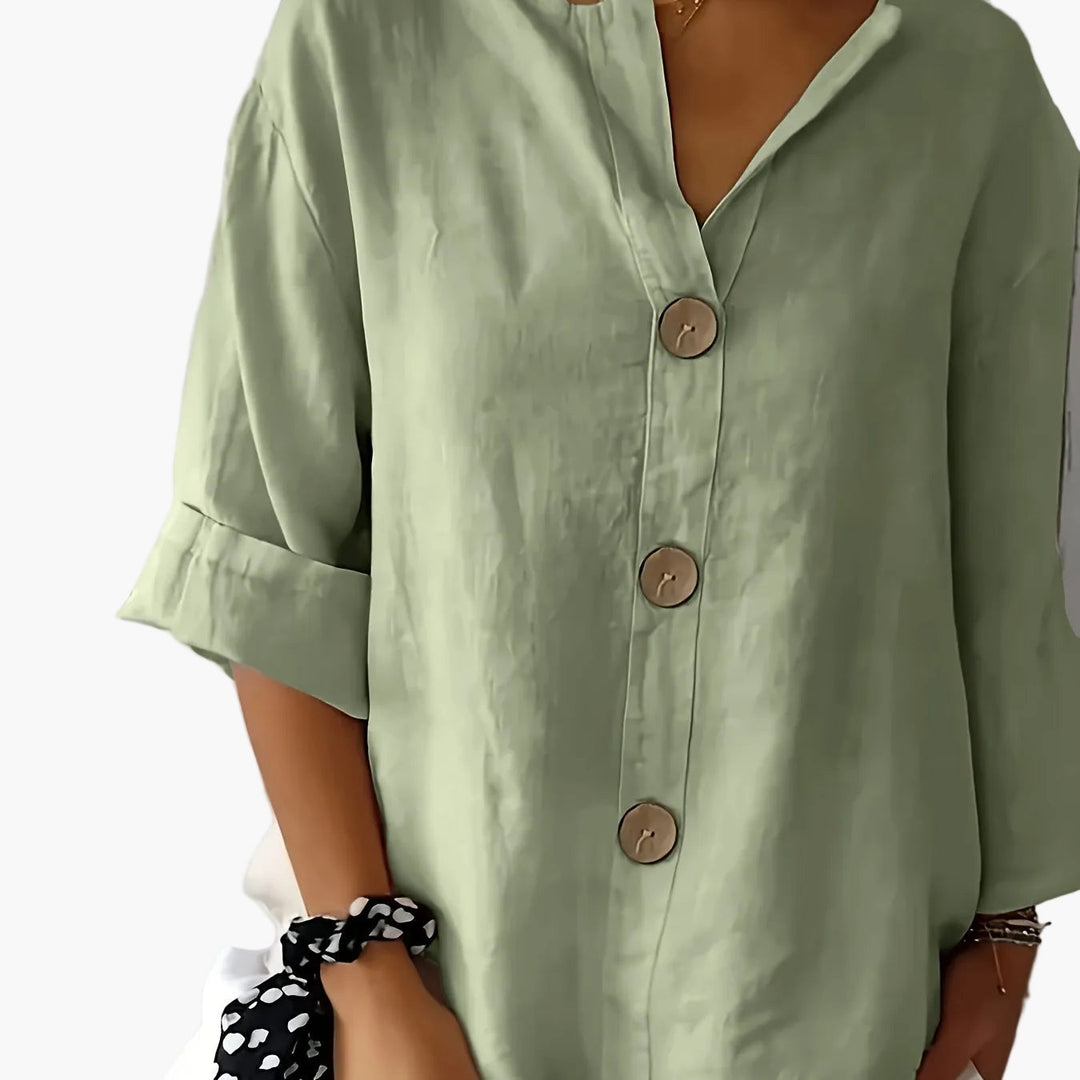 Stilvolle rosa Bluse für Damen mit elegantem V-Ausschnitt & praktischer Knopfleiste; Business & Casual.