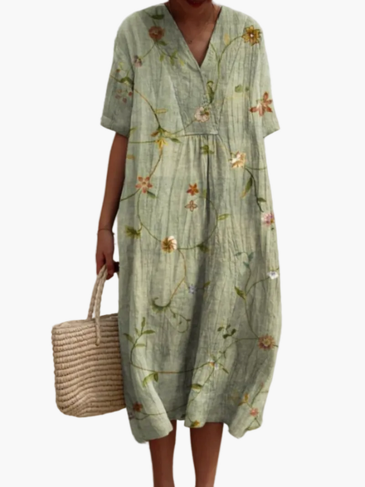 Modisches Freizeitkleid für Damen, Vintage-Design, florales Muster, kurze Ärmel, ideal für warme Tage.