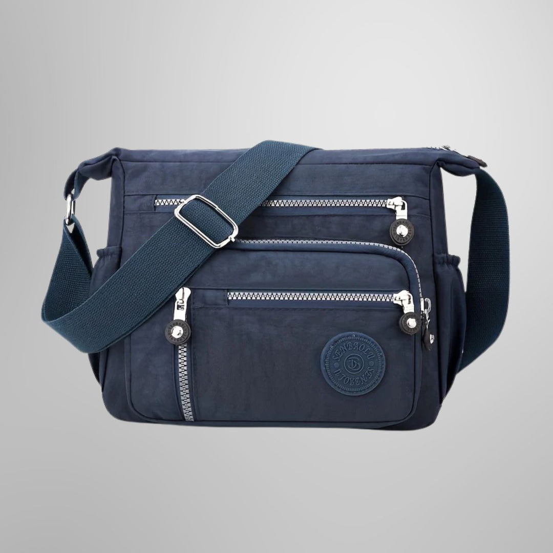 Geräumige Damen Umhängetasche mit Innenfächern. Perfekt zur Organisation von persönlichen Dingen.