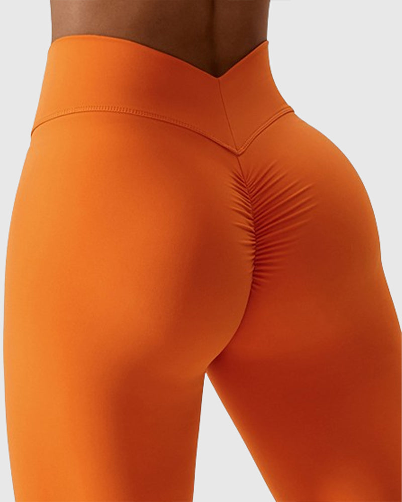Damen Yoga Hose mit V-Bund & Po-Lifting Effekt. Schwarze High Waist Fitness Leggings für Sport & Freizeit.