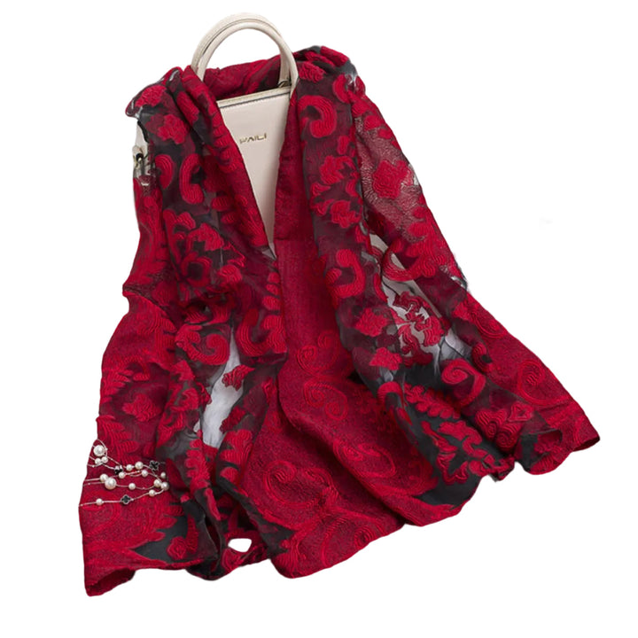 Leichter Damenschal mit floralem Druck & feinen Cut-Outs, perfekt für Frühling & Sommer.