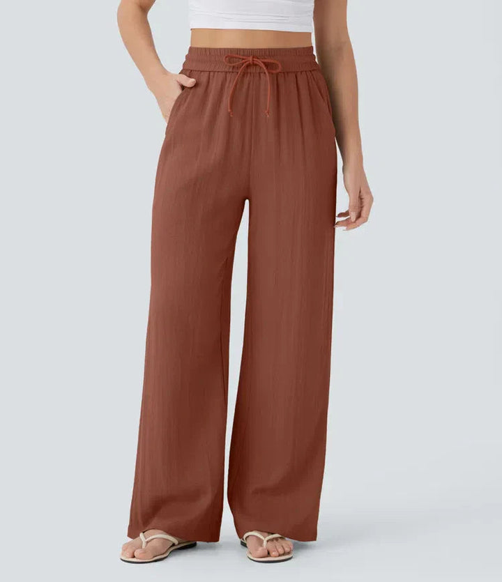 Elegante Damenhose mit weitem Bein, ideal für den Sommer. Bequeme Lockerpassform, Kordelzug.