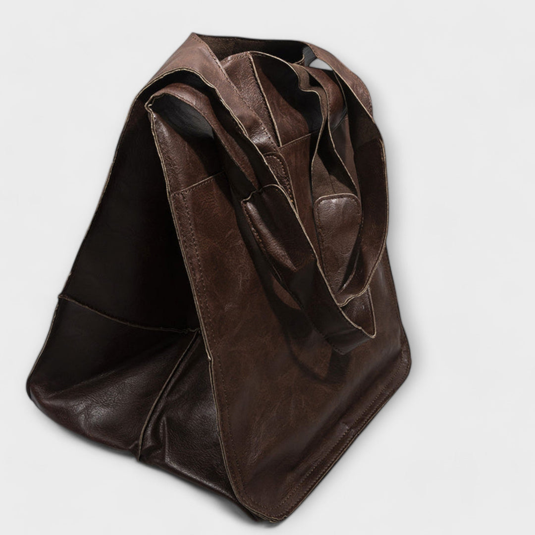 Wochenendtasche aus PU-Leder, geräumig & elegant, ideal für den nächsten Urlaub.