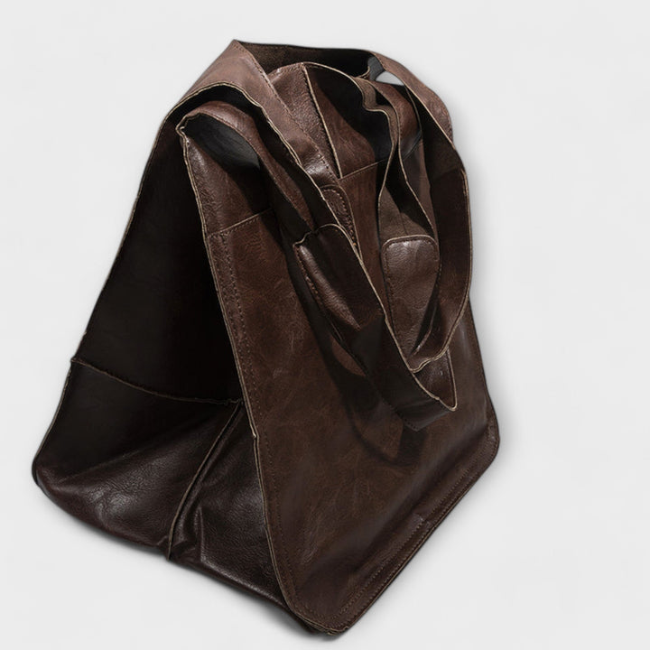 Wochenendtasche aus PU-Leder, geräumig & elegant, ideal für den nächsten Urlaub.
