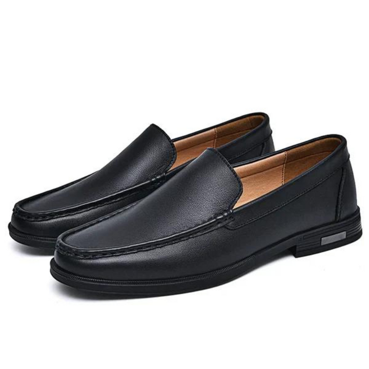 Handgefertigte schwarze italienische Slipper aus echtem Leder, für einen luxuriösen Herren-Look.