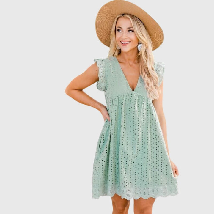 Stilvolles ärmelloses Damen Sommer Mini-Kleid mit V-Ausschnitt, entspannter Schnitt für mühelose Eleganz.
