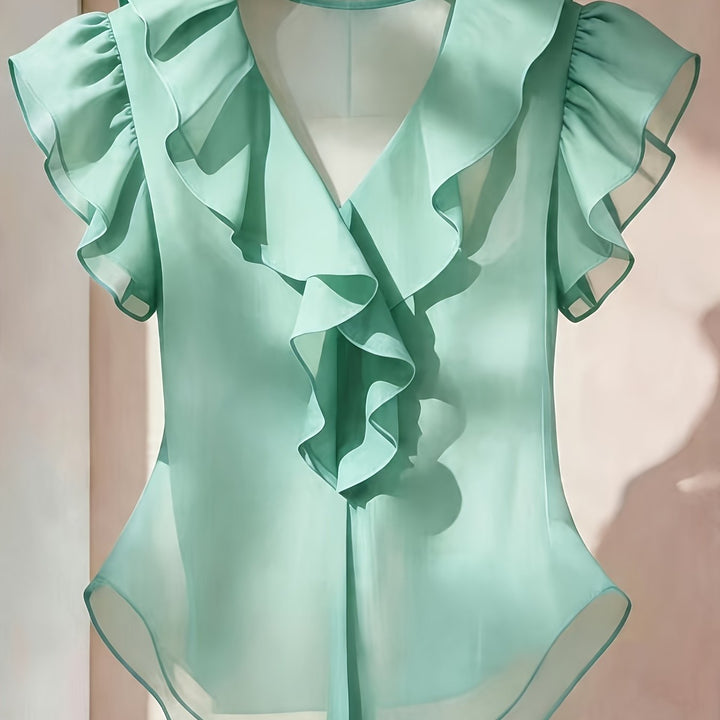 Modische Damenbluse mit Rüschen & Volantärmeln. Für einen frischen Look.