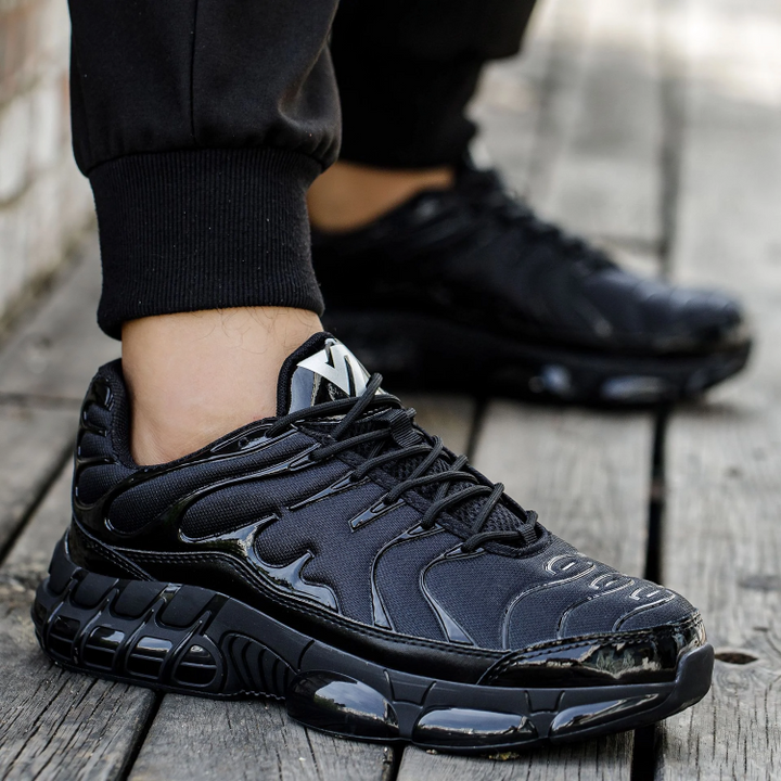 Schwarze Herren Sicherheitsarbeitsschuhe im Sneaker-Stil mit Stahlkappe, robustem Design & hohem Komfort für Arbeitsschutz.