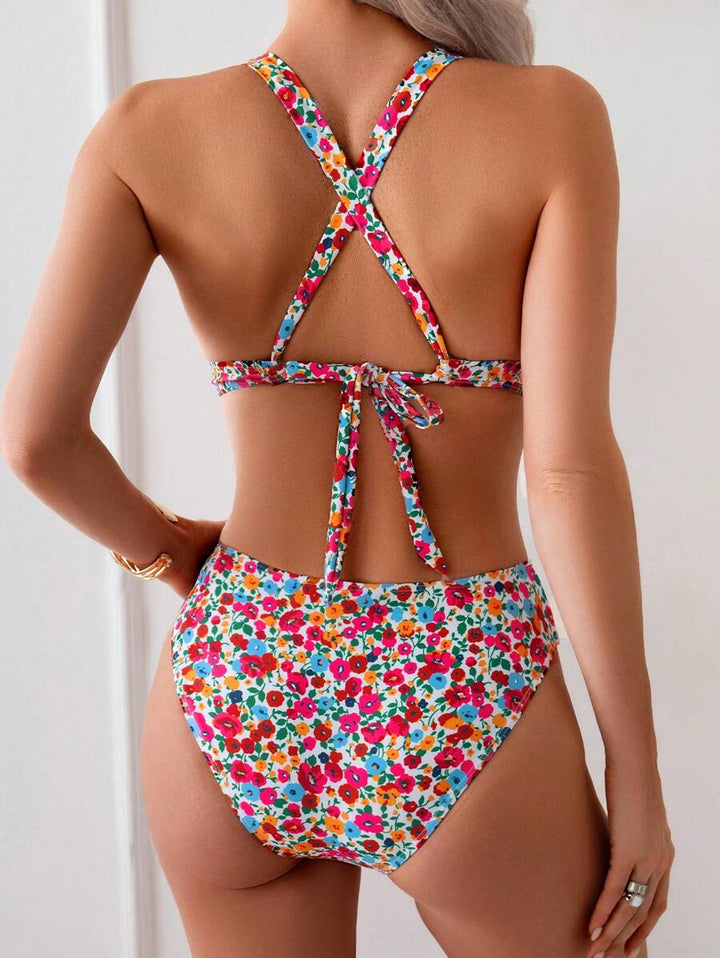 Stylischer Zweiteiler: Floraler Halterneck-Bikini mit V-Ausschnitt für Damen. Ideal für Sommerurlaub.