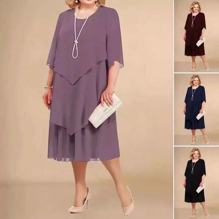 Elegantes Damen Midikleid, locker, fließend, kurzarm. Asymmetrisches Design für moderne Frauen.