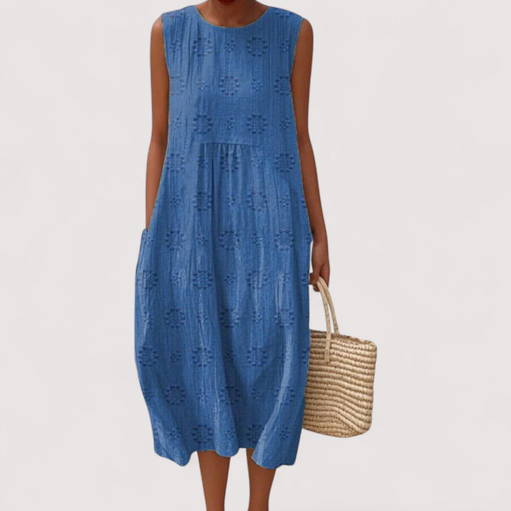 Leichtes, atmungsaktives Damen Sommerkleid mit floralem Muster. Ideales Freizeitkleid für heiße Sommertage.