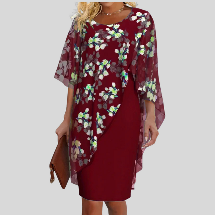 Schmeichelhaftes, elegantes Sommer Midikleid für Damen, tailliert und mit kurzer Ärmel, ideal für warme Tage.
