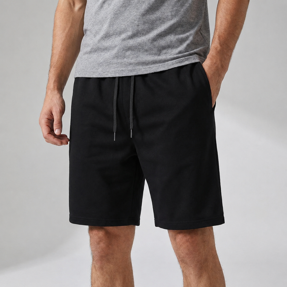 Graue Herren Sportshorts mit Kordelzug; ideal für Training, Freizeit und aktive Kleidung im Sommer.