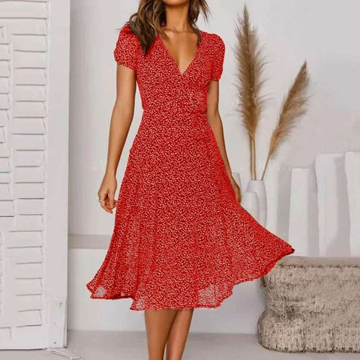Trendiges Damen A-Linien Wickel-Midikleid mit femininen Puffärmeln & V-Ausschnitt. Perfektes Sommer- & Partykleid.