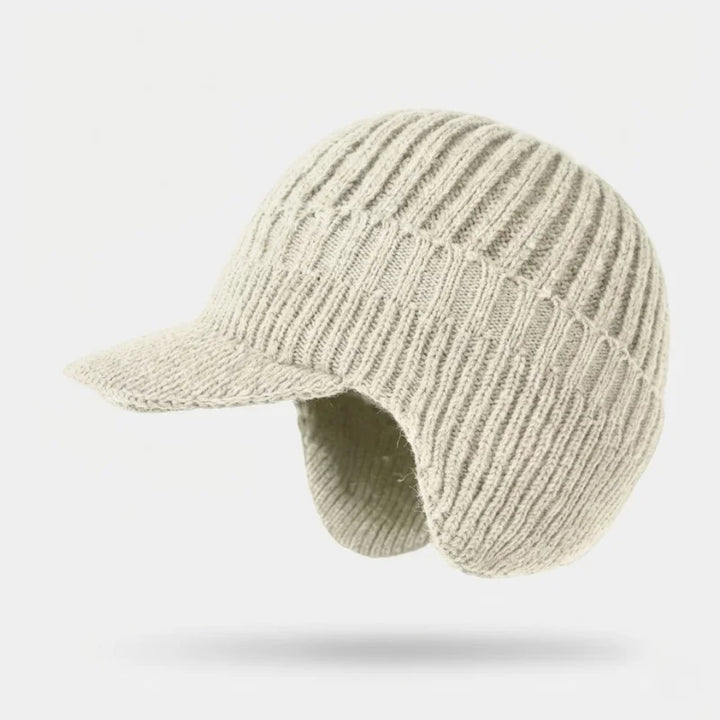 Bequeme Unisex Thermomütze mit Ohrenklappen in Dunkelblau, winddicht, hält Kopf und Ohren warm.