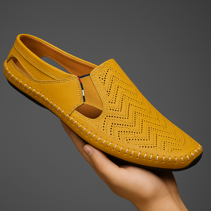 Leichte Männersandale in stilvollem Design. Atmungsaktive Sommerschuhe für warme Tage.