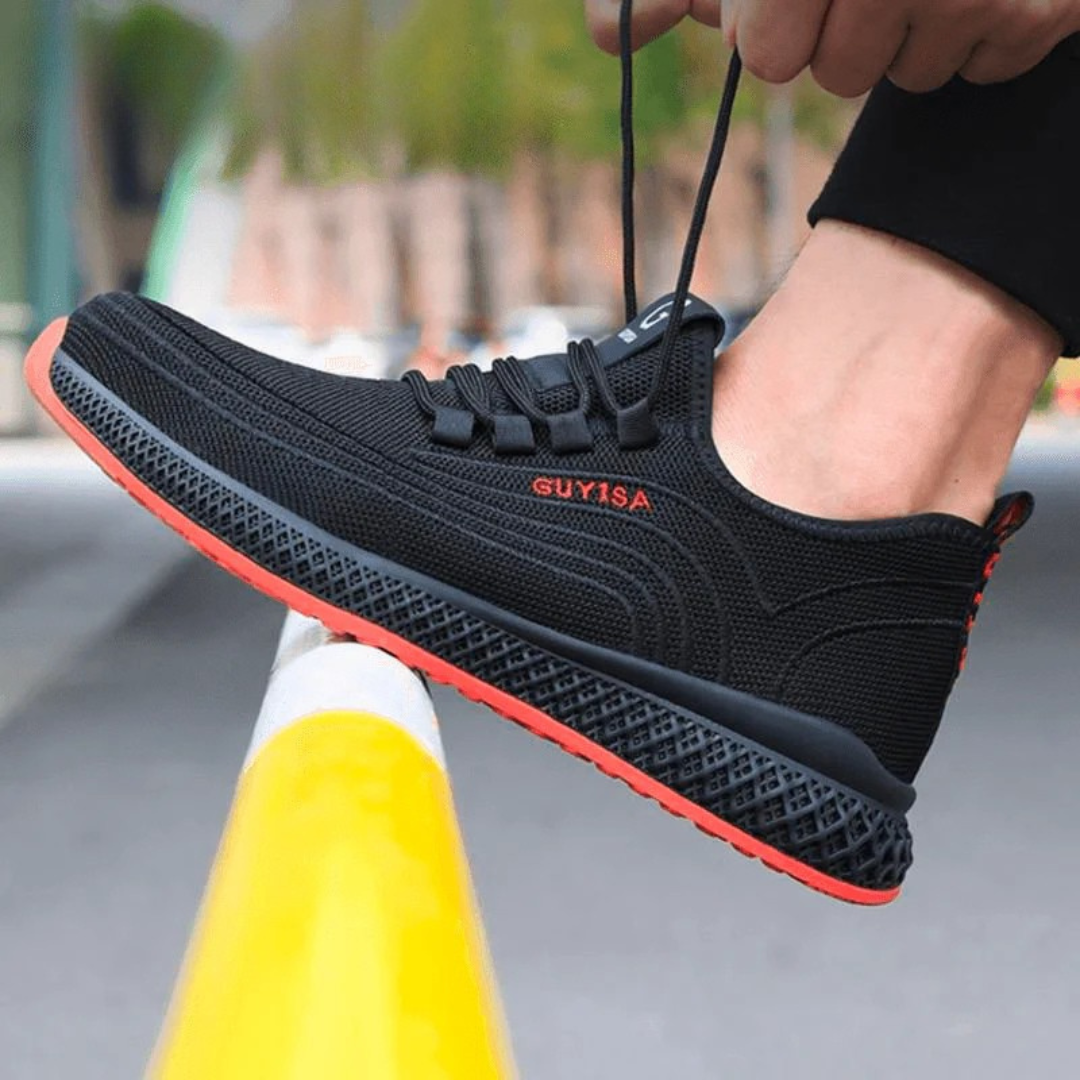 Ein Paar schwarze Herren-Schutzschuhe mit Stahlkappe und atmungsaktivem Design, Draufsicht zeigt Details.