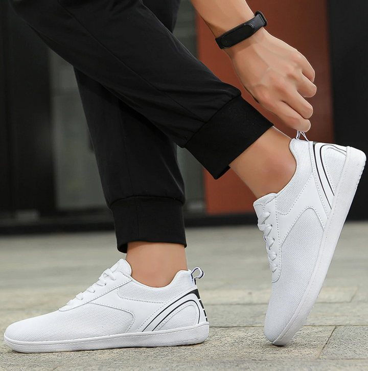 Unisex Barfußschuhe Luno, schwarze flexible Sohle, atmungsaktives Obermaterial für natürliches Gehen.