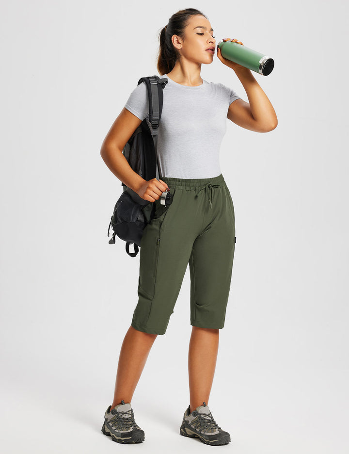 Frauen Outdoor-Capris, atmungsaktiv & dehnbar, mit sicheren Reißverschlusstaschen.