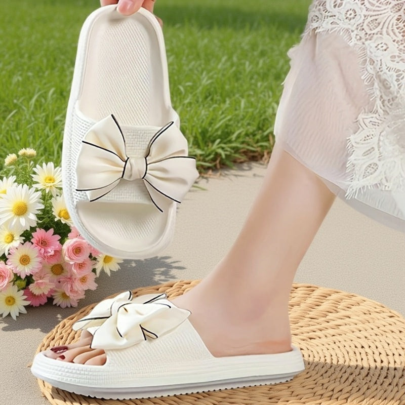 Elegante Damen Slide Sandalen mit dekorativer Schleife, perfekt für den Sommerurlaub.