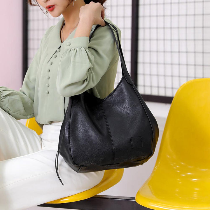 Moderne PU Schultertasche für Damen, vielseitig nutzbar als Alltag & Reisetasche.