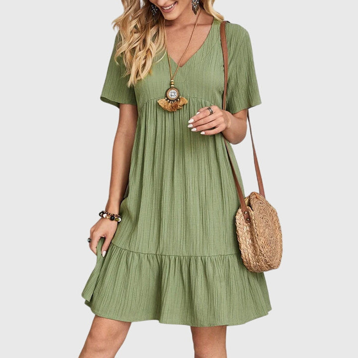Elegantes, leichtes Damen Midikleid im Boho-Stil. Flatterndes Sommerkleid mit Kurzarm, ideal für Freizeit & Mode.