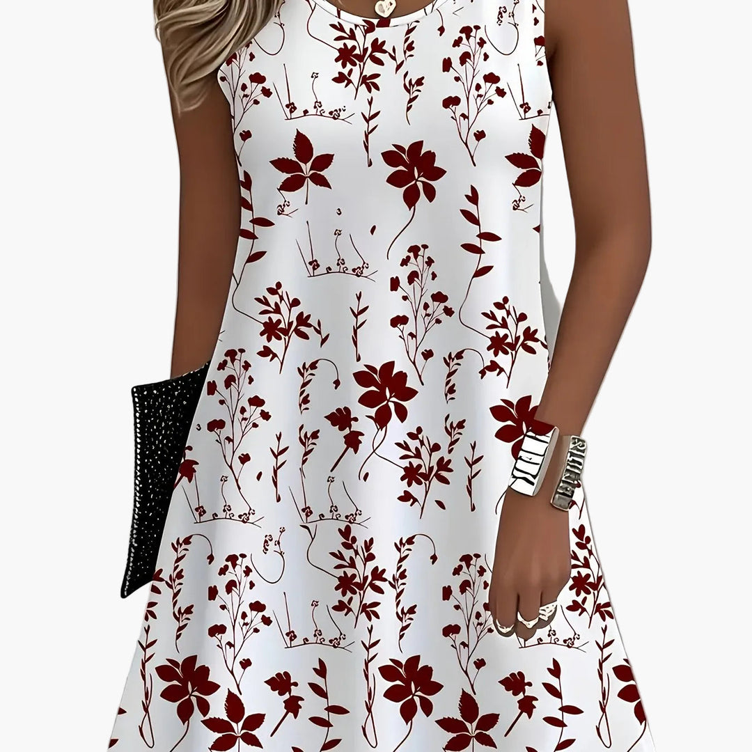 Trendiges ärmelloses Damen Sommerkleid mit floralem Muster. Ein Must-have für Frühling und Sommer.