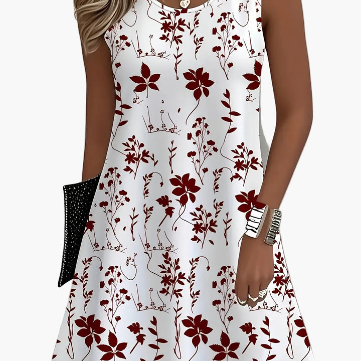 Trendiges ärmelloses Damen Sommerkleid mit floralem Muster. Ein Must-have für Frühling und Sommer.