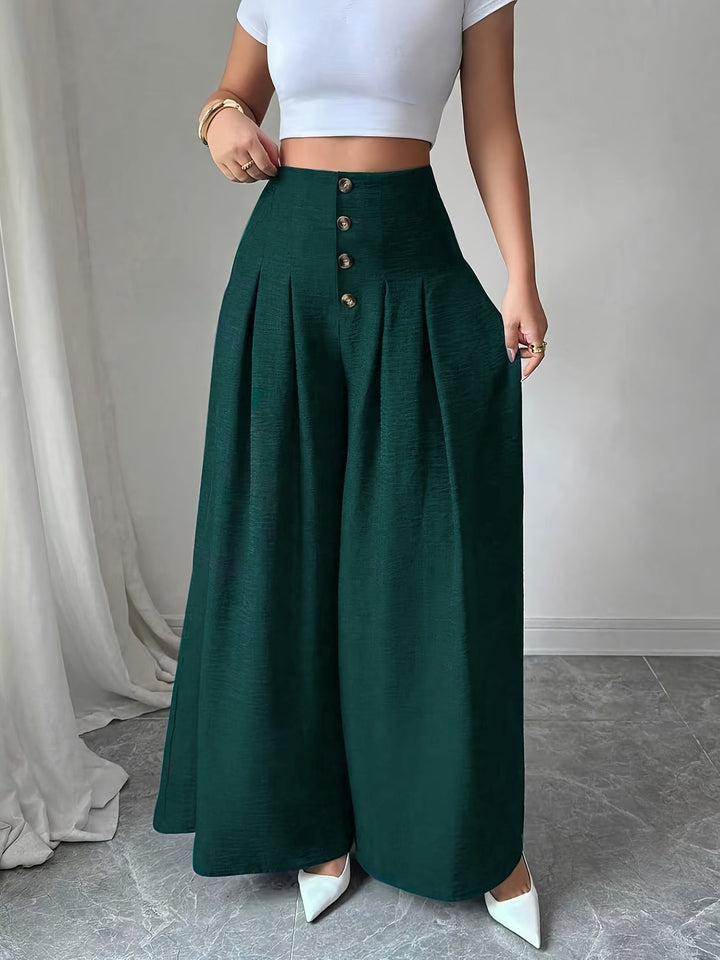 Stilvolle High-Waist Damenhose, weitbeinig in Dunkelgrün, bürotauglich & modern.