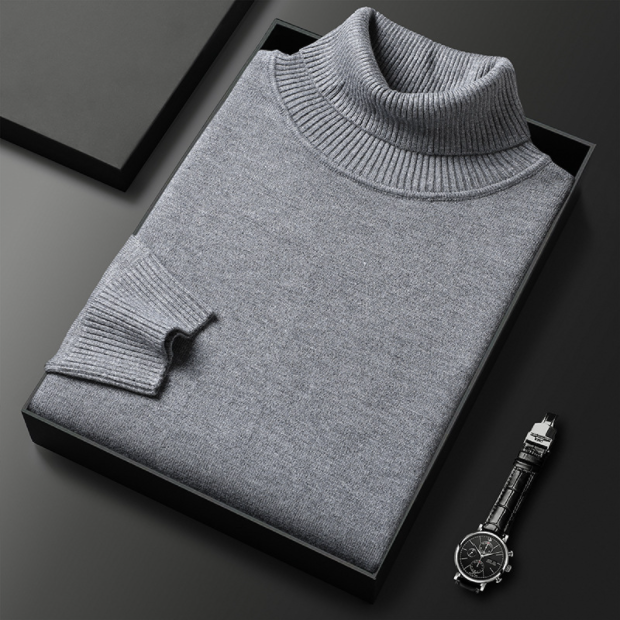 Detailaufnahme des hochwertigen Strickmusters am Herren Winter Rollkragenpullover. Warmer Langarmpullover.