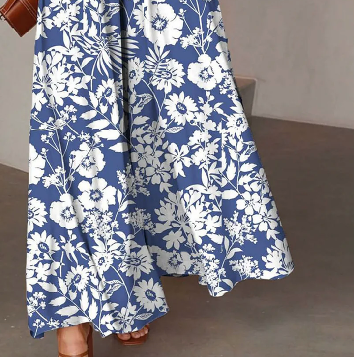 Gemütliche Damenhose mit fröhlichem Blumenmuster und elastischem Bund. Ideale Sommerhose für entspannte Tage.