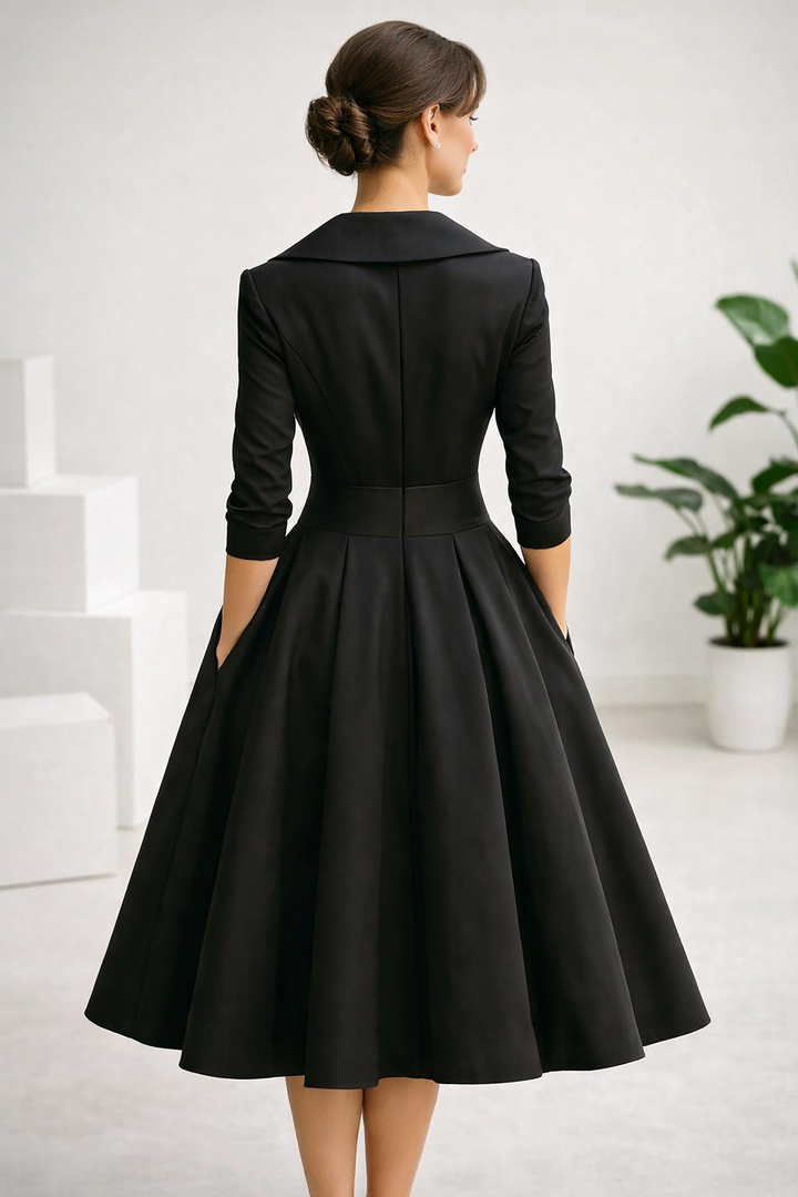 Damen A-Linien-Kleid als stilvolles Bürokleid. Midi-Länge, Schalkragen und 3/4 Ärmel betonen die Taille.