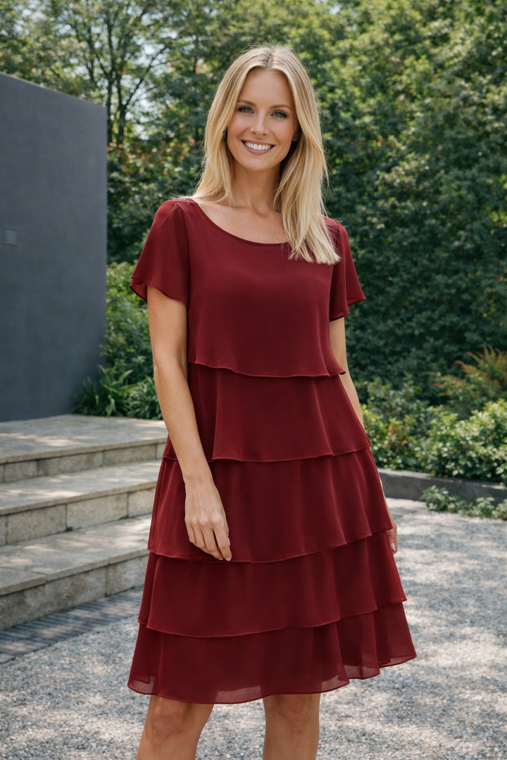 Elegantes Damen Rüschenkleid knielang in Schwarz mit lockerer Passform, kurzärmlig für Sommer und Freizeit. Komfortabel.