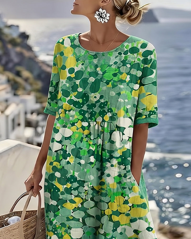 Bequemes Damen-Sommerkleid in Midilänge, mit zeitlosem Blumenmuster, perfekt für den Alltag.