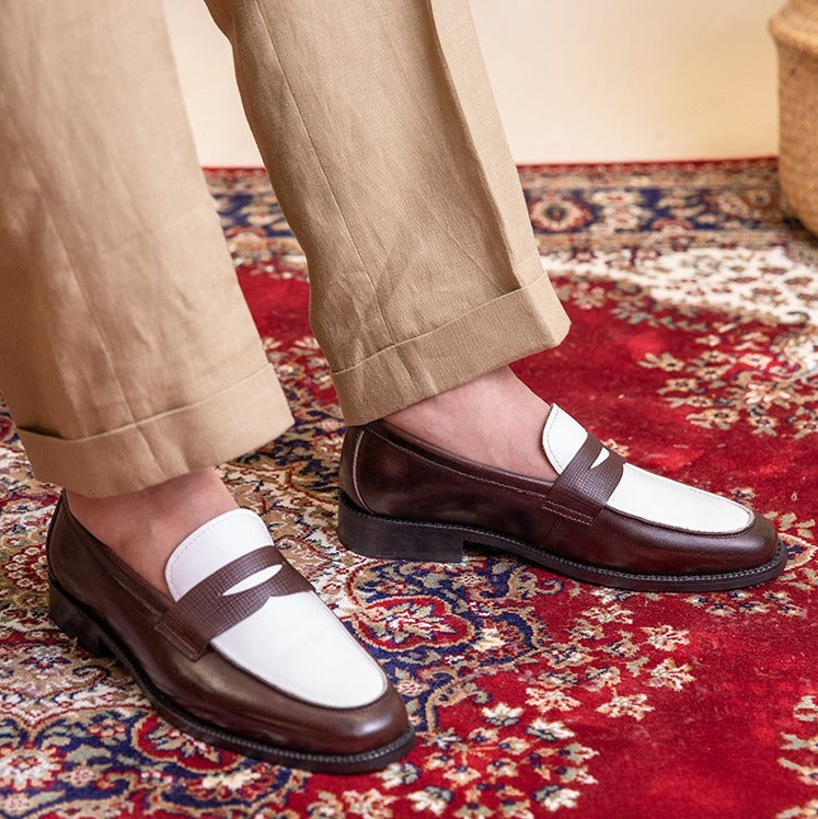 Elegante dunkelbraune Herren Loafer für Business und Freizeit, klassischer Penny-Stil, bequemes Schuhwerk.