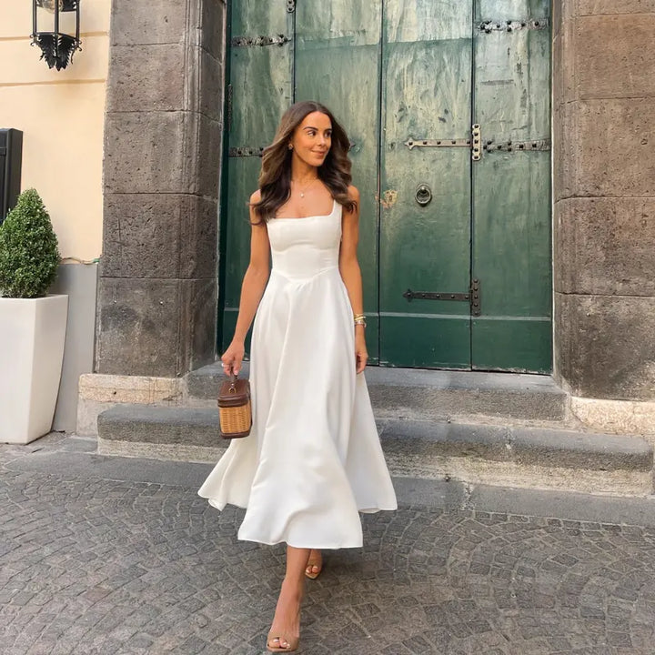 Damen Midikleid mit elegantem eckigem Ausschnitt und schmeichelhafter V-Taille, ideal für festliche Anlässe.