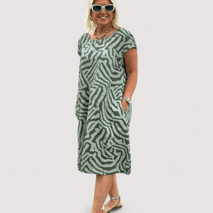 Vielseitiges Damenkleid, locker & atmungsaktiv, geeignet als Freizeit-, Sommer- oder elegantes Alldress.